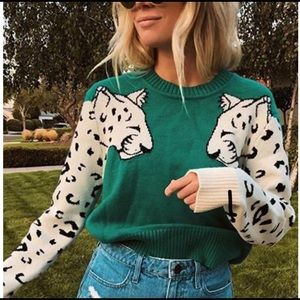 Leopard print sleeve crew neck sweater